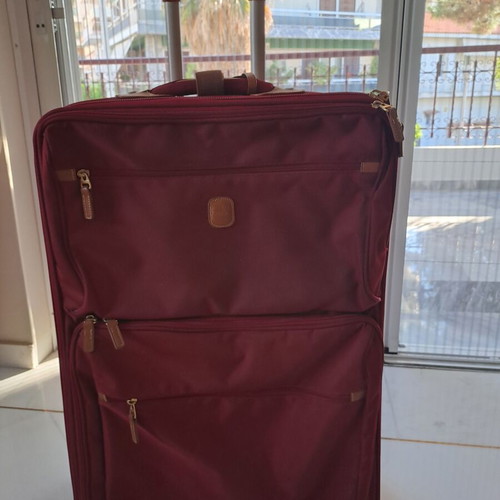 Hunter suitcase like new with leather details and large capacity