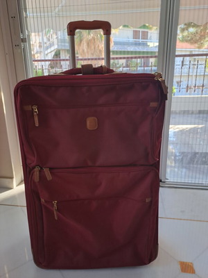 Hunter suitcase like new with leather details and large capacity