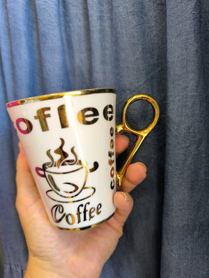 porcelain mug with gold inscriptions