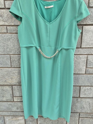 Formal women's dress turquoise with gold chain detail