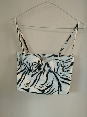 Corset-style tiger print strap top with zipper, comfortable