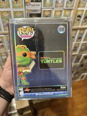 Funko Pop Michelangelo Teenage Mutant Ninja Turtles vinyl figure eating pizza