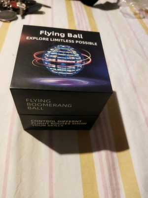 Flying illuminated boomerang ball like new