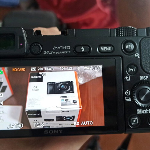 Sony a6000 with Sigma 30mm f/1.4 Contemporary lens like new