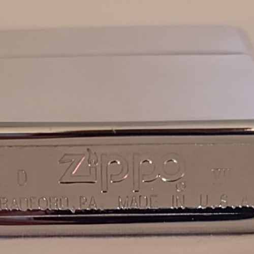 Zippo Colossus of Rhodes lighter used, laser engraved, made in USA