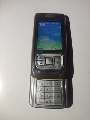 Nokia E65 slider phone with charger