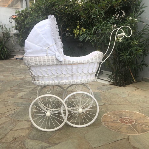 Doll pram used with white wicker basket
