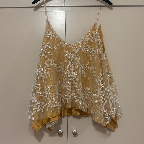 NidoDileda top with open back, yellow and white