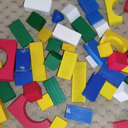 Wooden and magnetic toys used, including plastic mini tic-tac-toe and balls