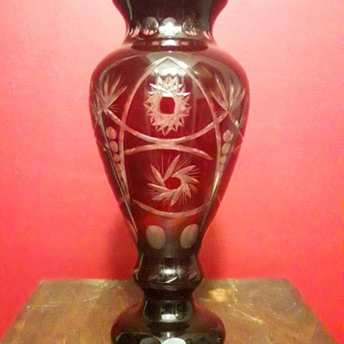 Bohemian heavy crystal vase used, deep red color