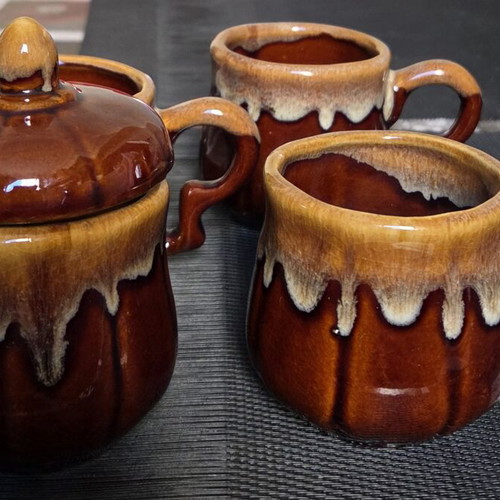 Ceramic tea and coffee set with three cups and sugar jar like new