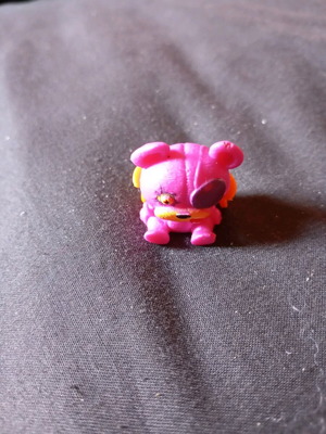 Figure used, purple teddy bear