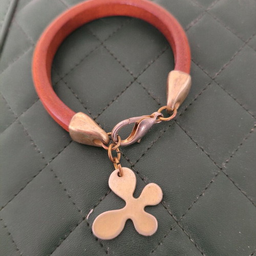 Wooden bracelet like new with gold details and clover charm