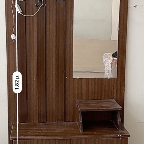 Vintage entrance furniture used with hooks, mirror and light