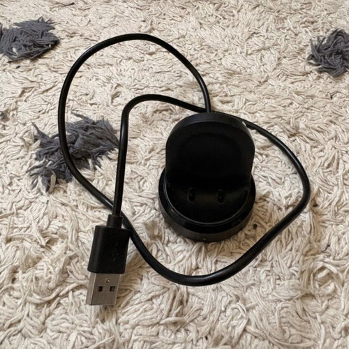 Samsung Galaxy Watch 46mm used with charger and 4 straps