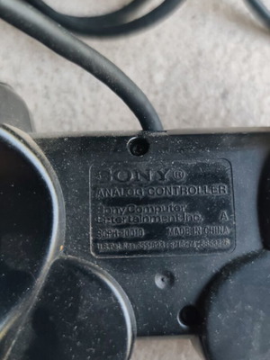 PlayStation 2 controller authentic used, functional