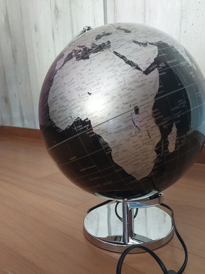Black and white globe lamp with switch