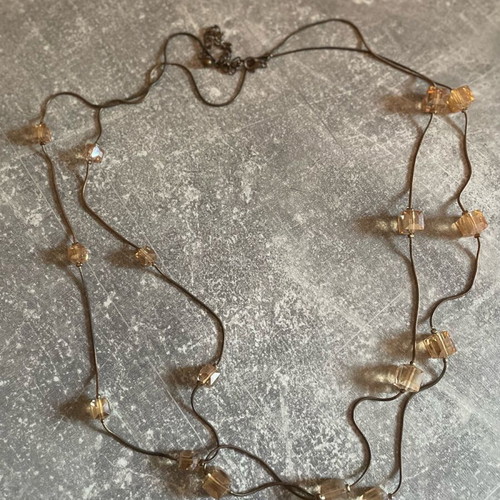Gold-colored necklace with stones like new