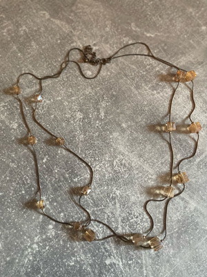 Gold-colored necklace with stones like new