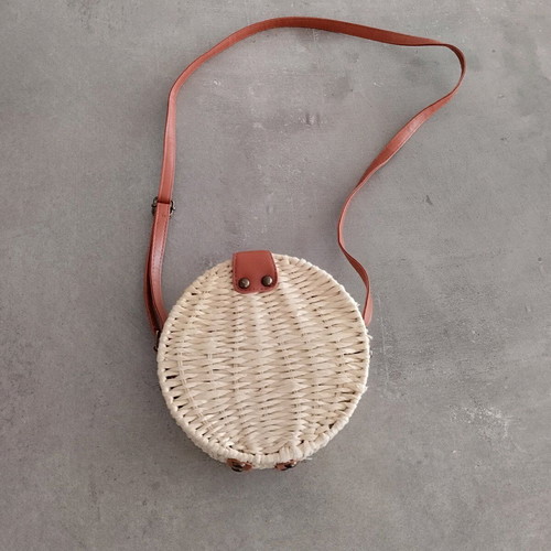 Straw bag round like new with brown strap