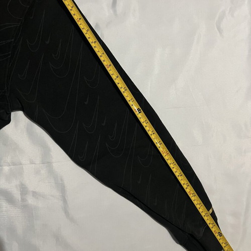 Nike black hoodie with Swoosh pattern, medium