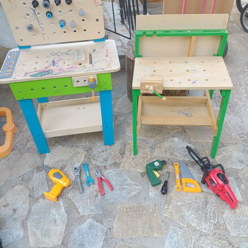 Children's wooden workbench used with tools