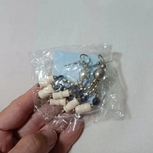 Modern hanging earrings new with white and gray details