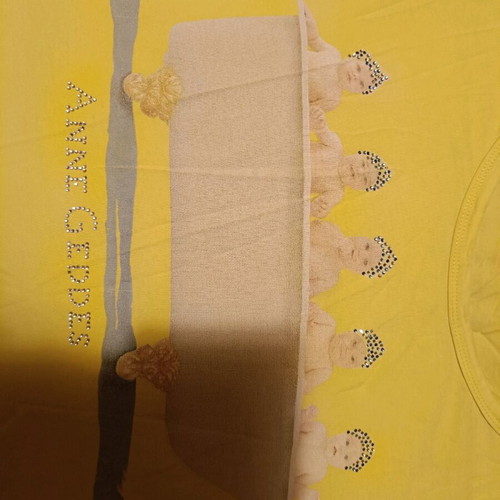 Yellow top medium used with rhinestones and Anne Geddes design