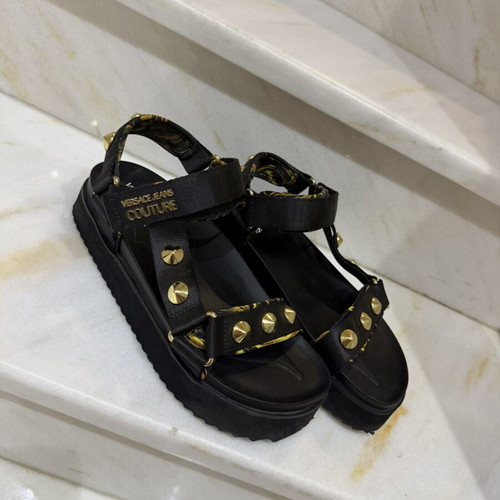 Versace sandals used, black and gold, size 40