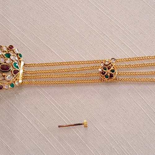 Vintage gold bracelet with colorful stones