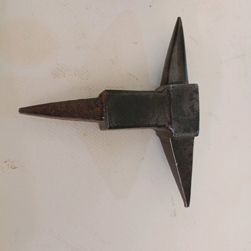 Anvil used for goldsmith or watchmaker with wooden base