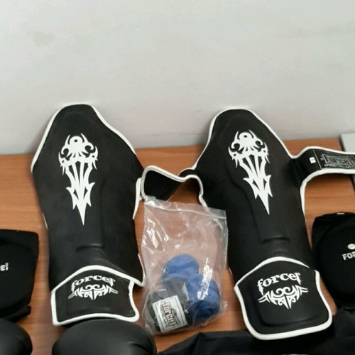 Martial arts set almost new with leather gloves, shin guards, elbow pads