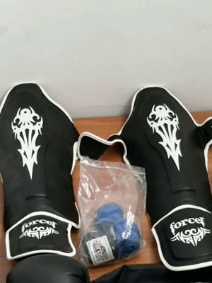 Martial arts set almost new with leather gloves, shin guards, elbow pads
