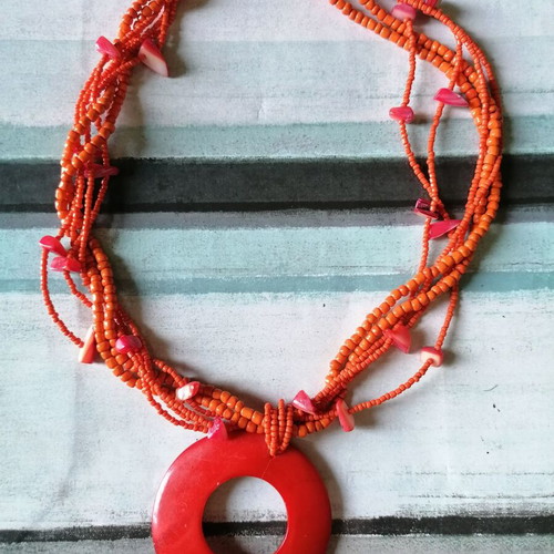 Necklace new with orange shell and beads