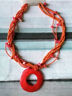 Necklace new with orange shell and beads
