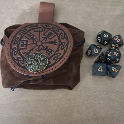 Runic leather dice bag with black marbled D&D dice set