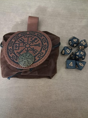 Runic leather dice bag with black marbled D&D dice set