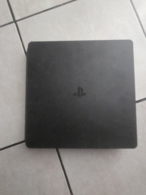PlayStation 4 Slim 1TB console like new, chipped