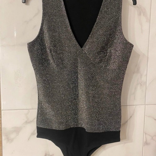 Bodysuit like new with silver rhinestones, size S