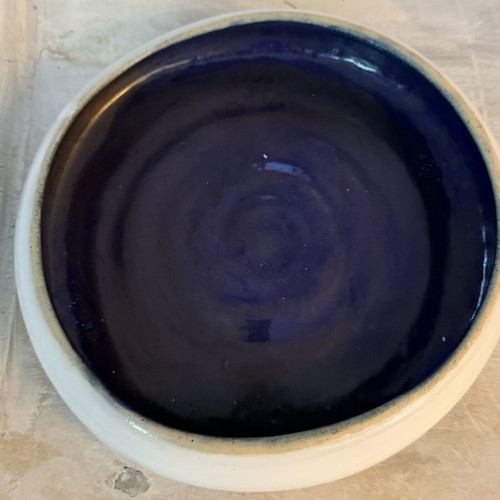 Handmade ceramic bowl new, white exterior and indigo interior