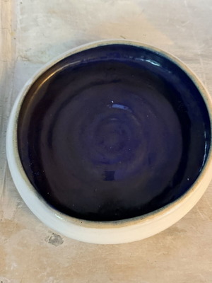 Handmade ceramic bowl new, white exterior and indigo interior