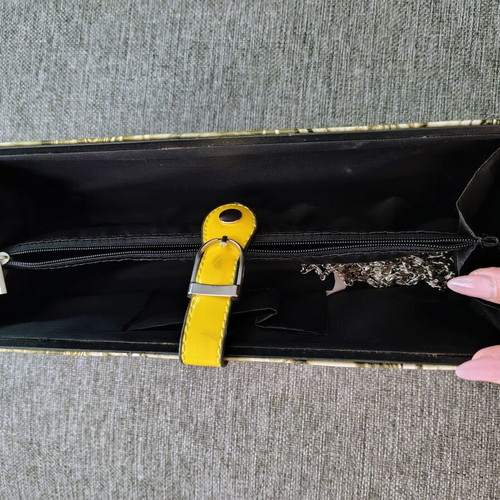 Clutch bag with chain strap, black and yellow