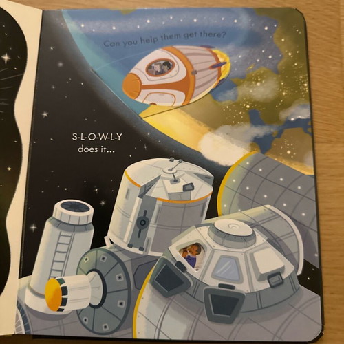 Usborne Peep Inside How a Rocket Works book like new in English