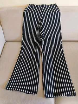 Striped women's pants used, size M, black and white