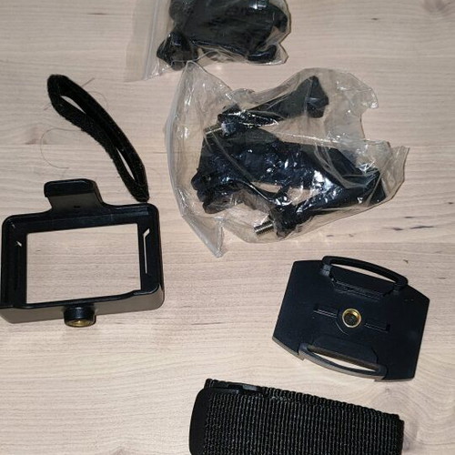 Action camera like new with waterproof case and mounting accessories