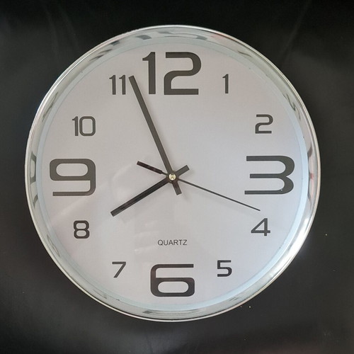 Quartz wall clock used, 30cm diameter, analog