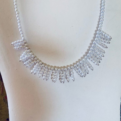 Necklace with white faux pearls and fringe design, new