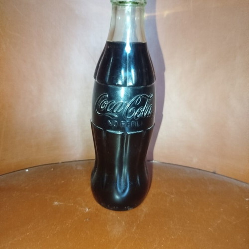 Coca-Cola collectible glass bottle like new from 70s-80s with original cap