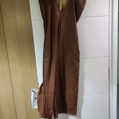 One-piece jumpsuit used, brown faux leather, one size