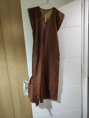 One-piece jumpsuit used, brown faux leather, one size
